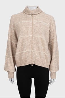 Cardigan decorated with sequins with a tag