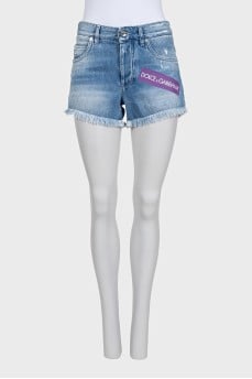 Denim shorts with fringe and logo