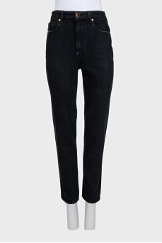 Black straight jeans with a gold button