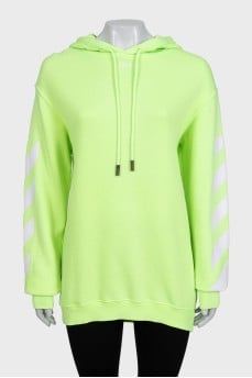 Green oversized hoodie with a signature print