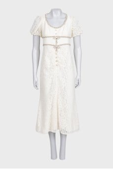 White lace dress decorated with rhinestones