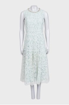 Fitted dress with a decorated zipper top