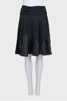 Black pleated skirt with draped waist