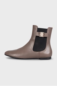 Leather boots decorated with bows