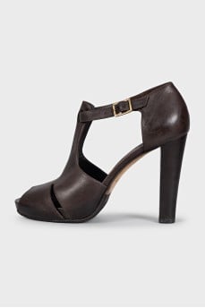 Brown leather sandals with a stacked heel