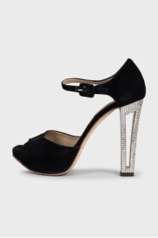 Black sandals with decorated heels