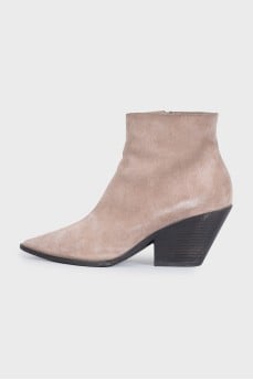 Beige ankle boots with a beveled heel