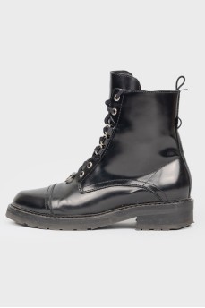 Black leather shoes on lacing and lightning
