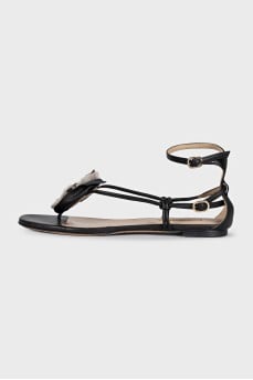 Black leather sandals with decoration
