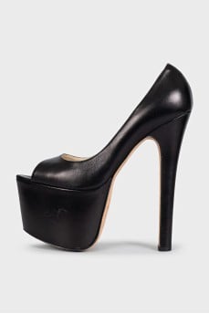 Leather shoes with a high platform and heels