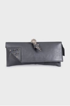 Gray leather clutch with accent decor
