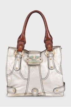 Vintage gold-colored leather bag