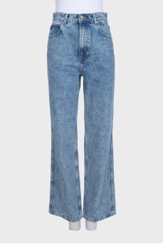 Blue jeans decorated with rhinestones