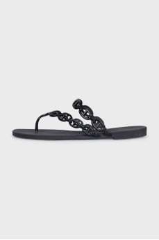 Black rubber flip flops
