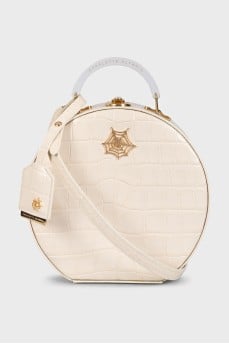Round embossed leather bag