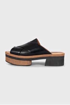 Black leather clogs