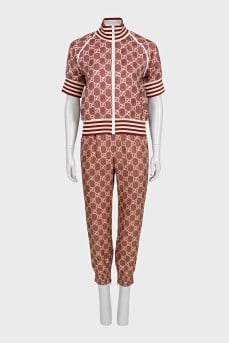 Silk suit with stripes in a signature print