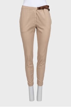 Brown trousers with a belt