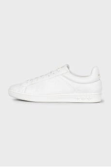 White leather sneakers with branded embossing