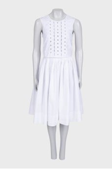 Fitted white dress with perforations