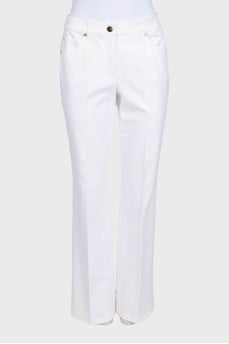 White high-waist flared trousers