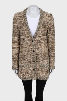 Knitted cardigan with buttons and fringe