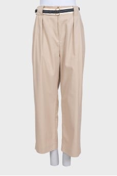 Beige straight trousers with a belt