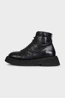 Black leather lace-up boots