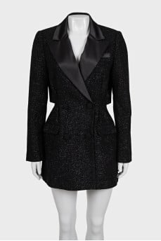 Black dress with a cutout back and tag