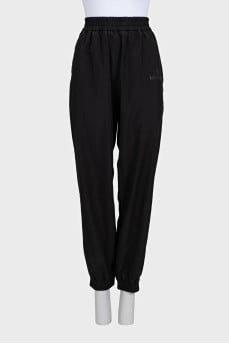 Black sports trousers with elastic waistband