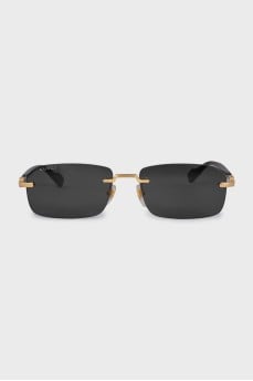 Солнцезащитные очки с золотистыми элементыми 