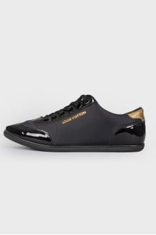 Black sneakers with varnish inserts