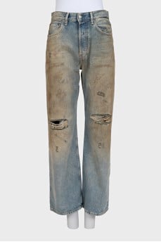 Straight-leg blue jeans with a distressed effect