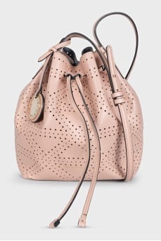 Pink leather bag decorated with perforations