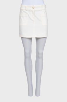 Mini skirt with patch pockets