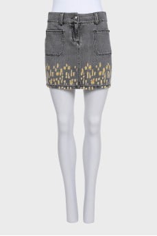 Denim mini skirt with a ripped effect