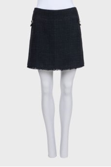 Mini skirt decorated with chains