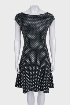 Fitted black dress with a print