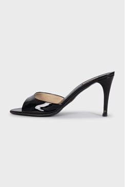 Black patent leather heeled mules