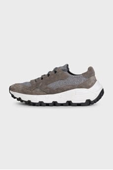 Gray sneakers made of suede and shiny fabric