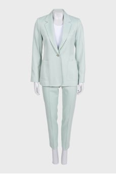Green straight-cut suit with tag