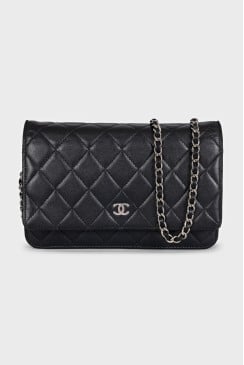 Quilted leather crossbody bag with snap closure