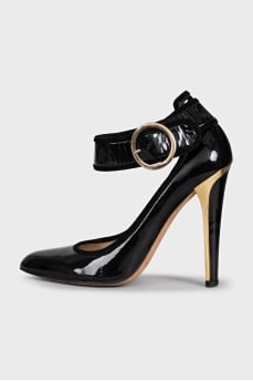 Patent black shoes with a wide strap