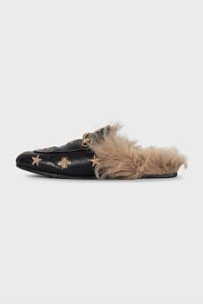 Black leather mules lined with fur