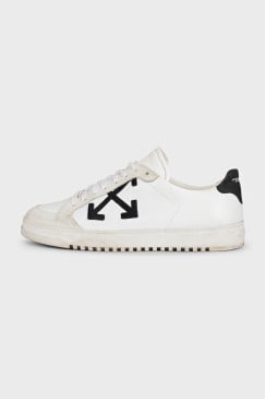 White leather sneakers with black heels