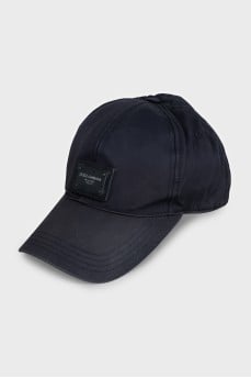 Men's blue cap with a brand logo