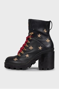 Leather ankle boots with gold embroidery