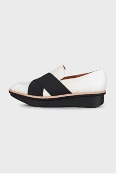 Black and white textile slip-ons