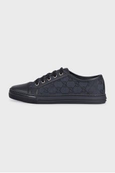 Black leather sneakers with textile inserts