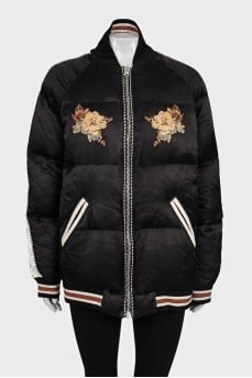 Insulated bomber jacket decorated with embroidery